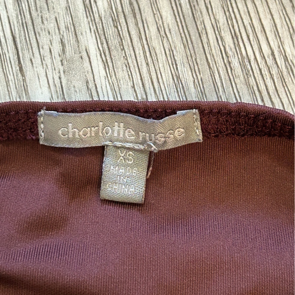 CHARLOTTE RUSSE burgundy one piece lace up bodysuit. New condition. Bottom snaps - Picture 2 of 6